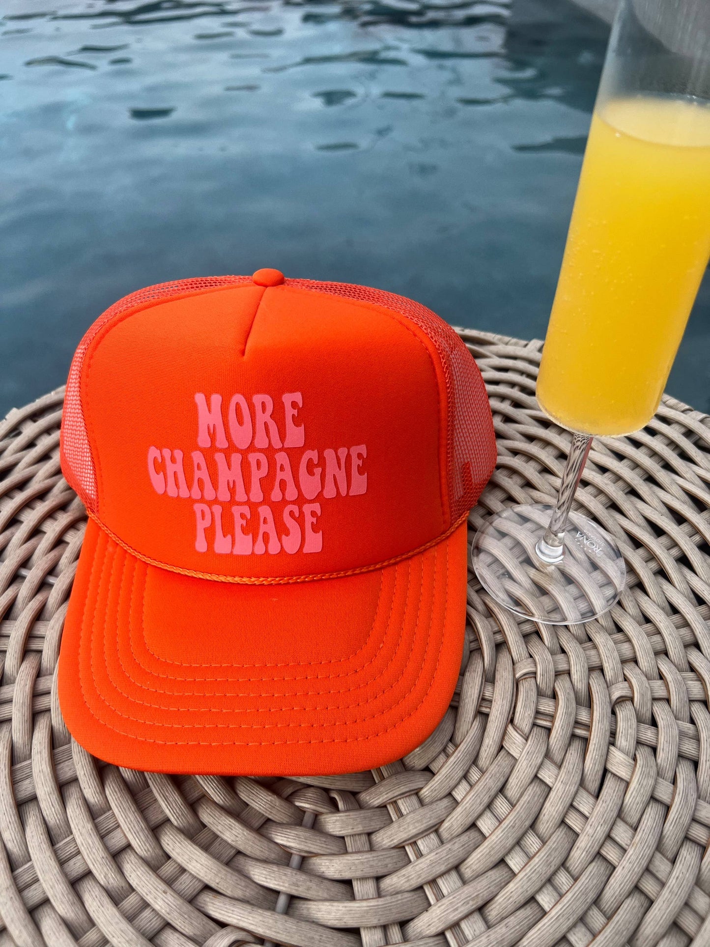 More Champagne Please Trucker Hat: Orange